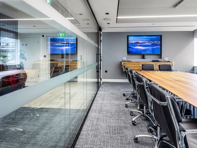 conference room with a wooden table and chairs